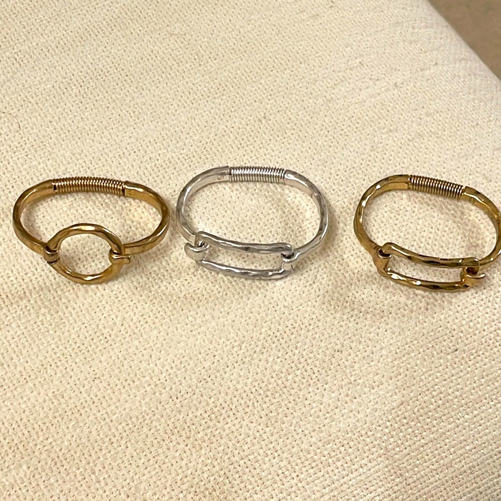 Three bracelets gold silver